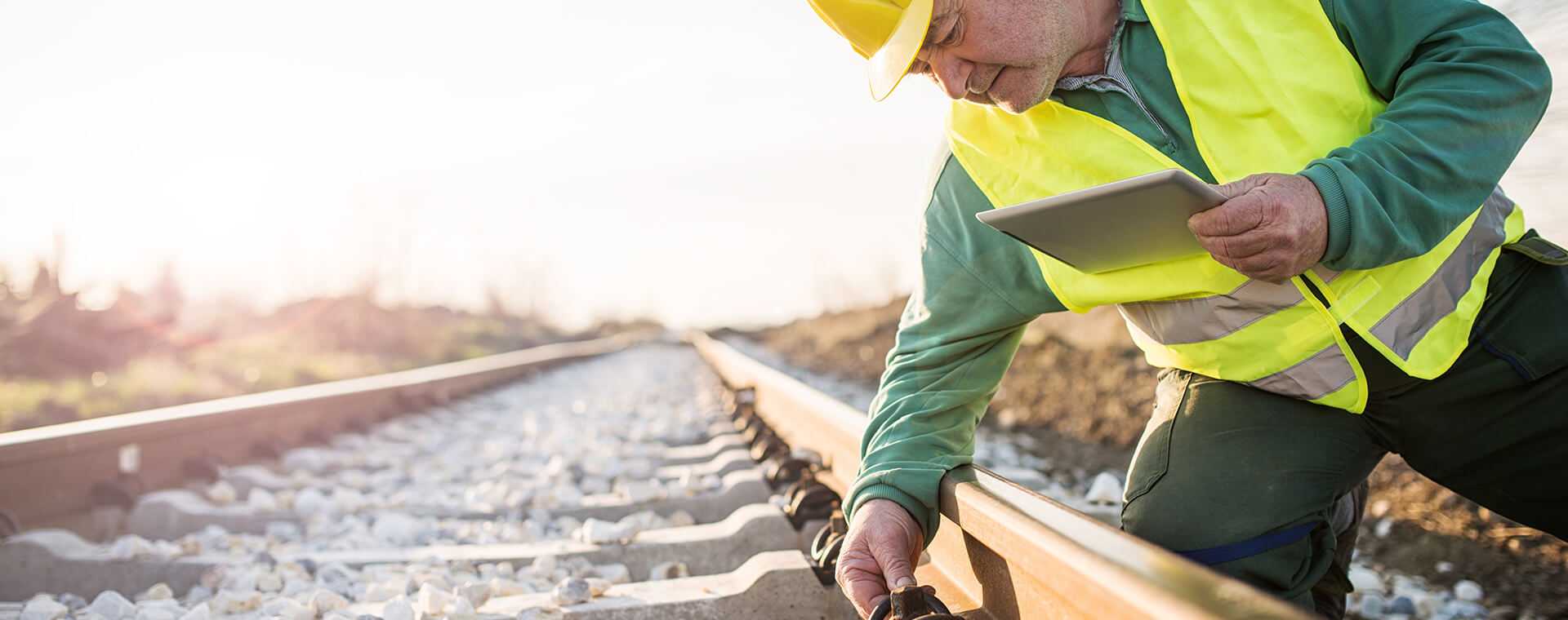 Someone inspecting a train track.