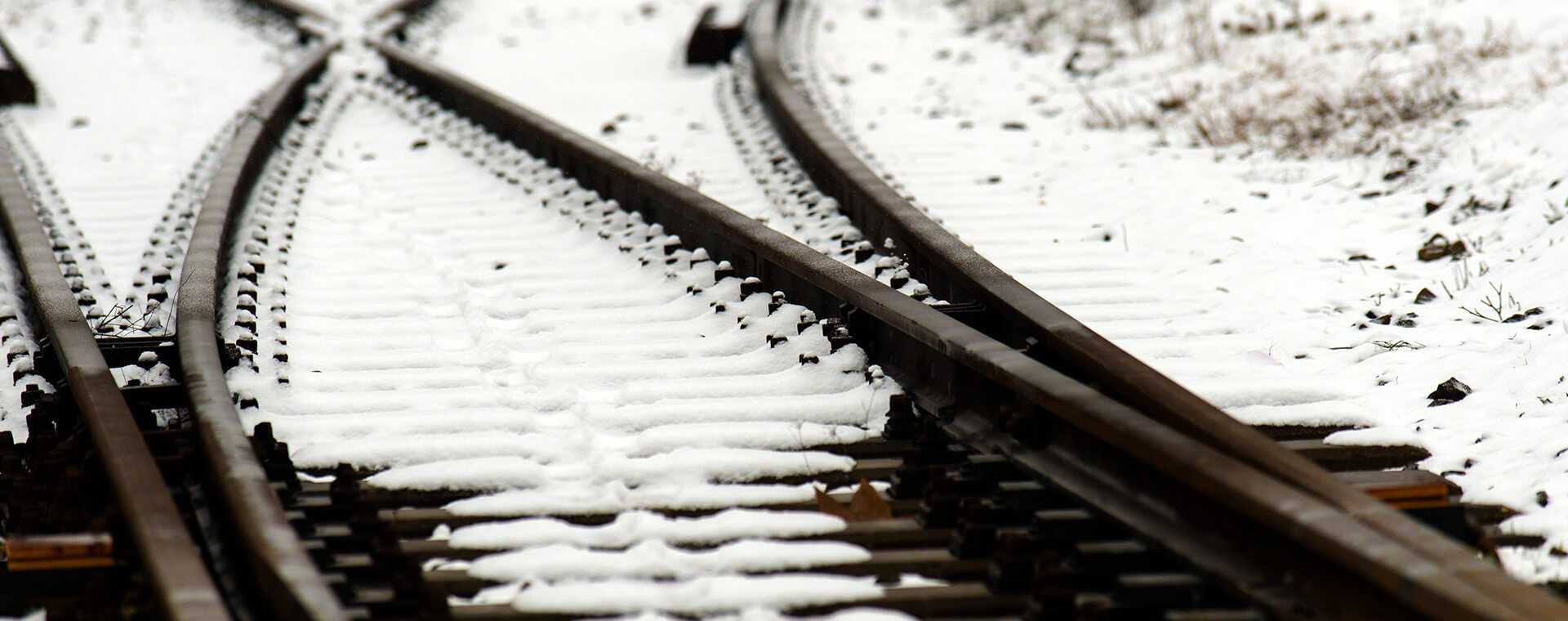 A train track covered in snow.